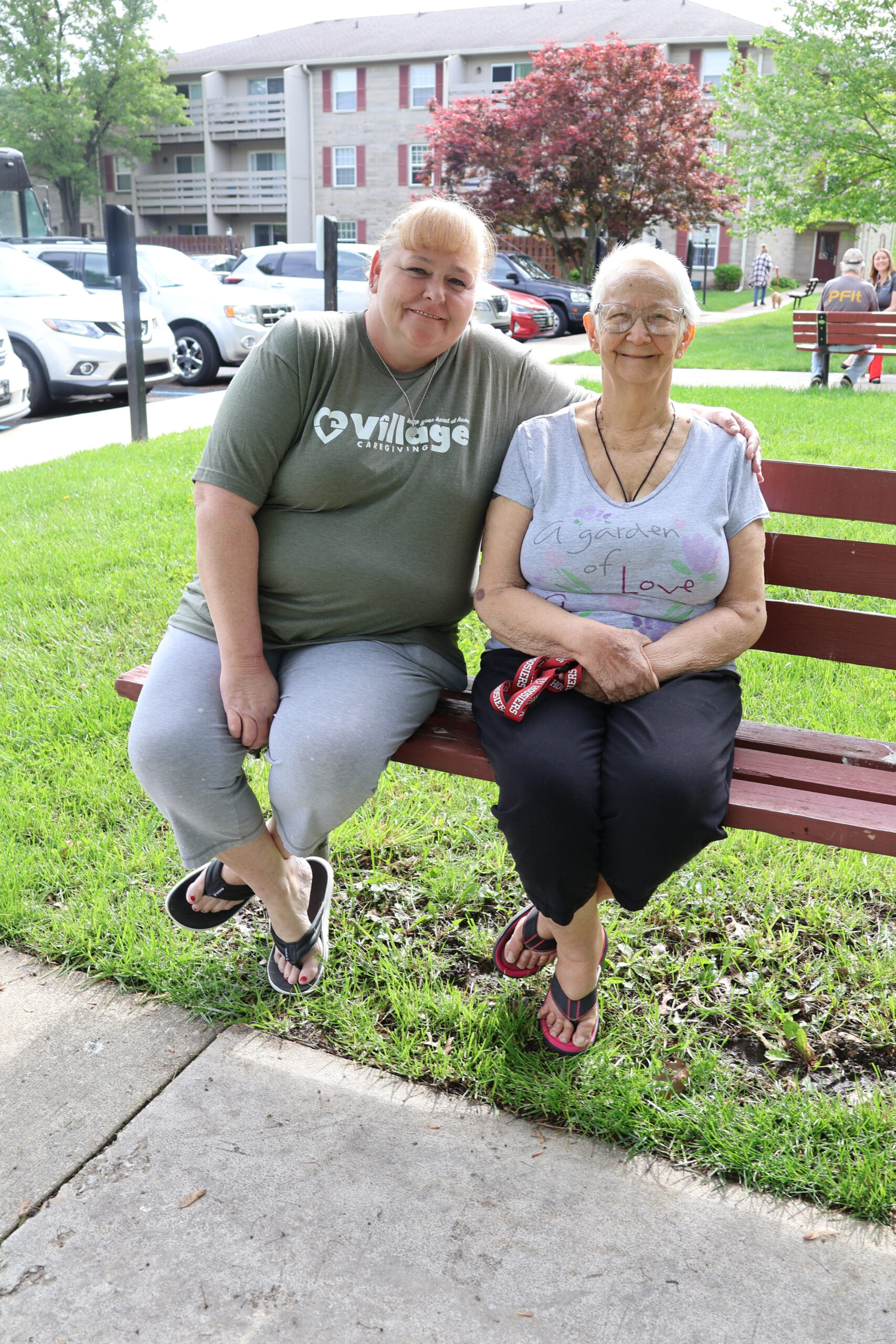 IMG_3978 Caregiver and senior woman sitting and talking on a couch